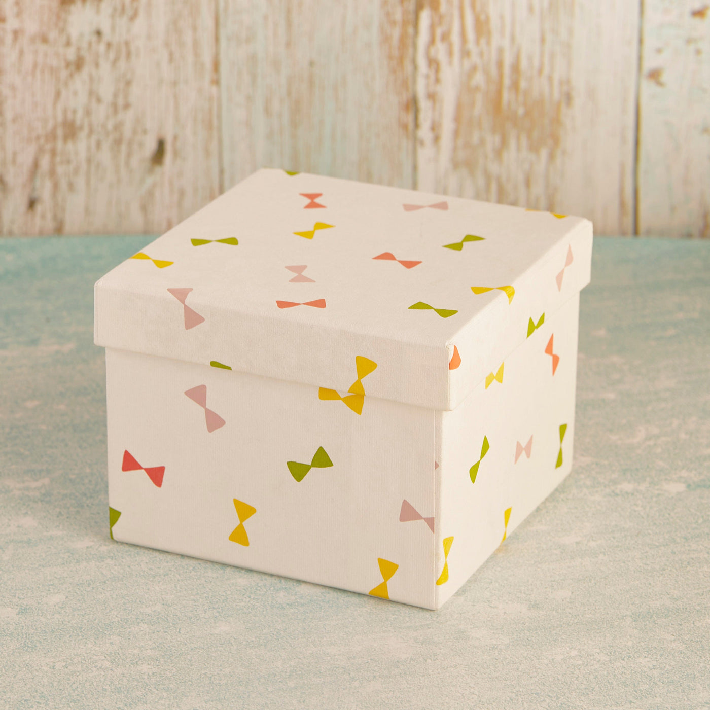 White Gift Box with multicoloured bowties  